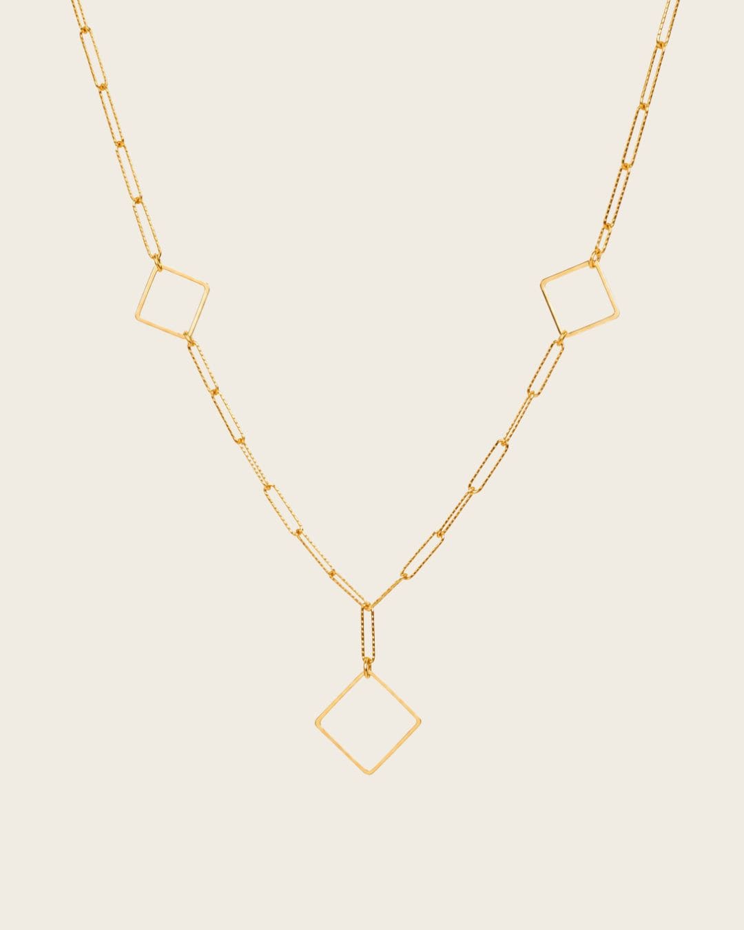 Collier chaîne avec carrés dorés femme